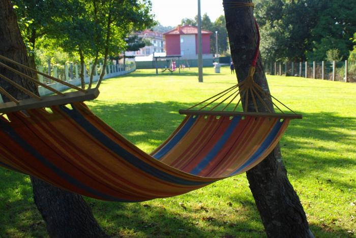 Apartamentos VIDA Finisterre - hamaca - jardin